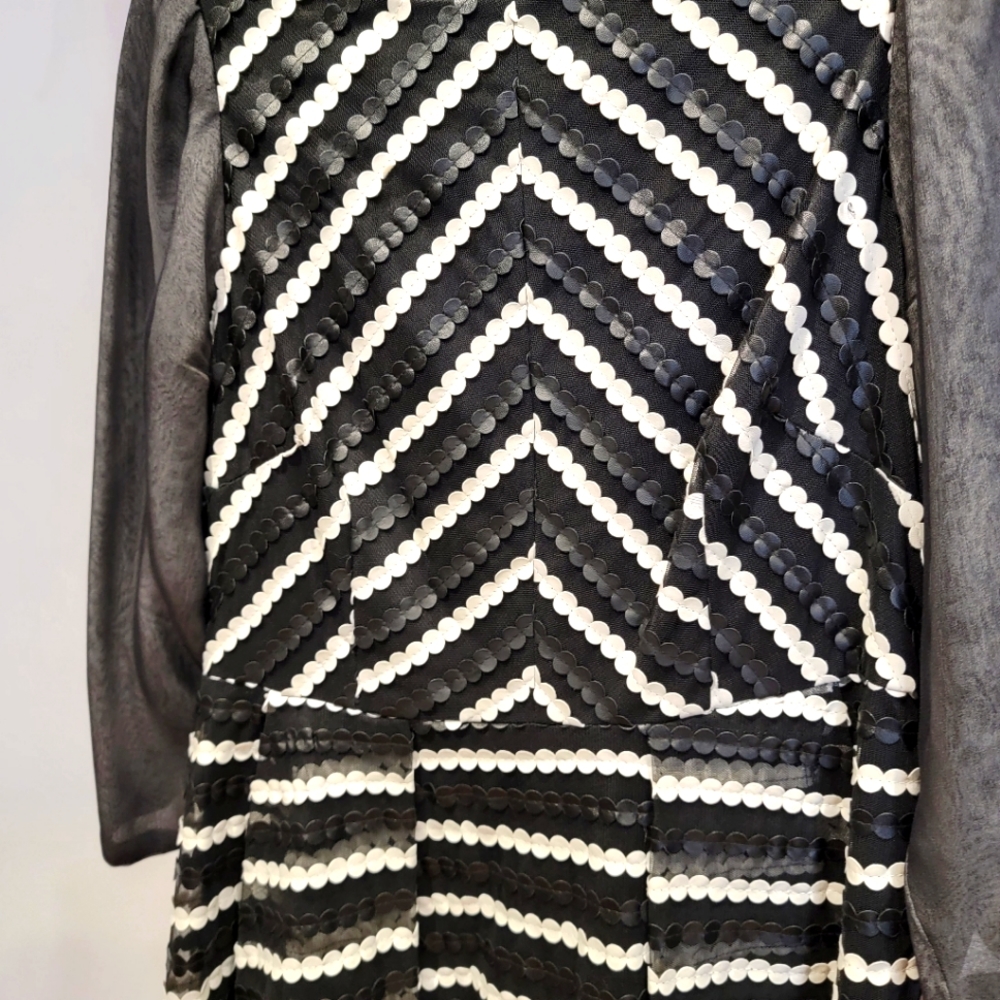Designer Eva Franco dramatic white and black dress